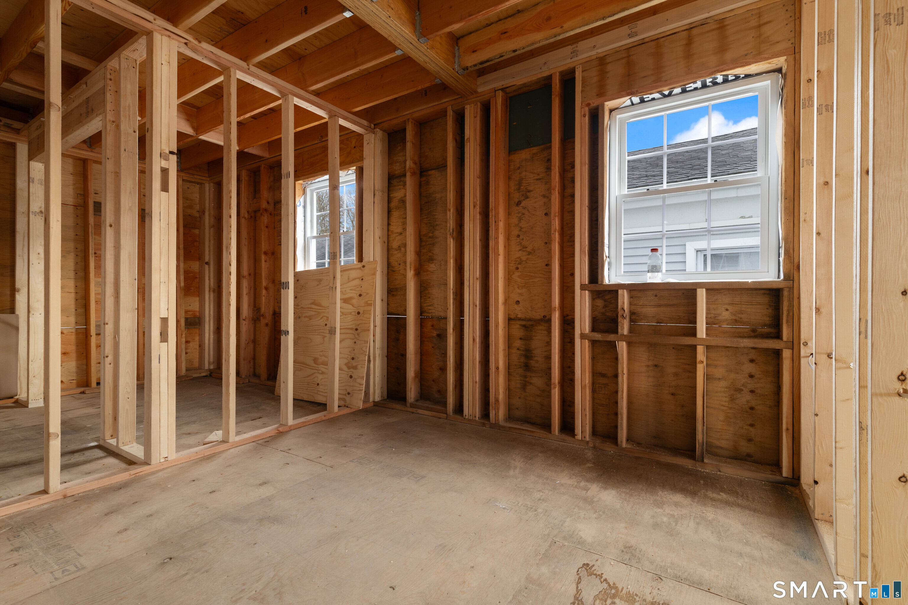 108 Thames Street Groton, CT 06340 - Photo 35 of 40 an empty room with windows