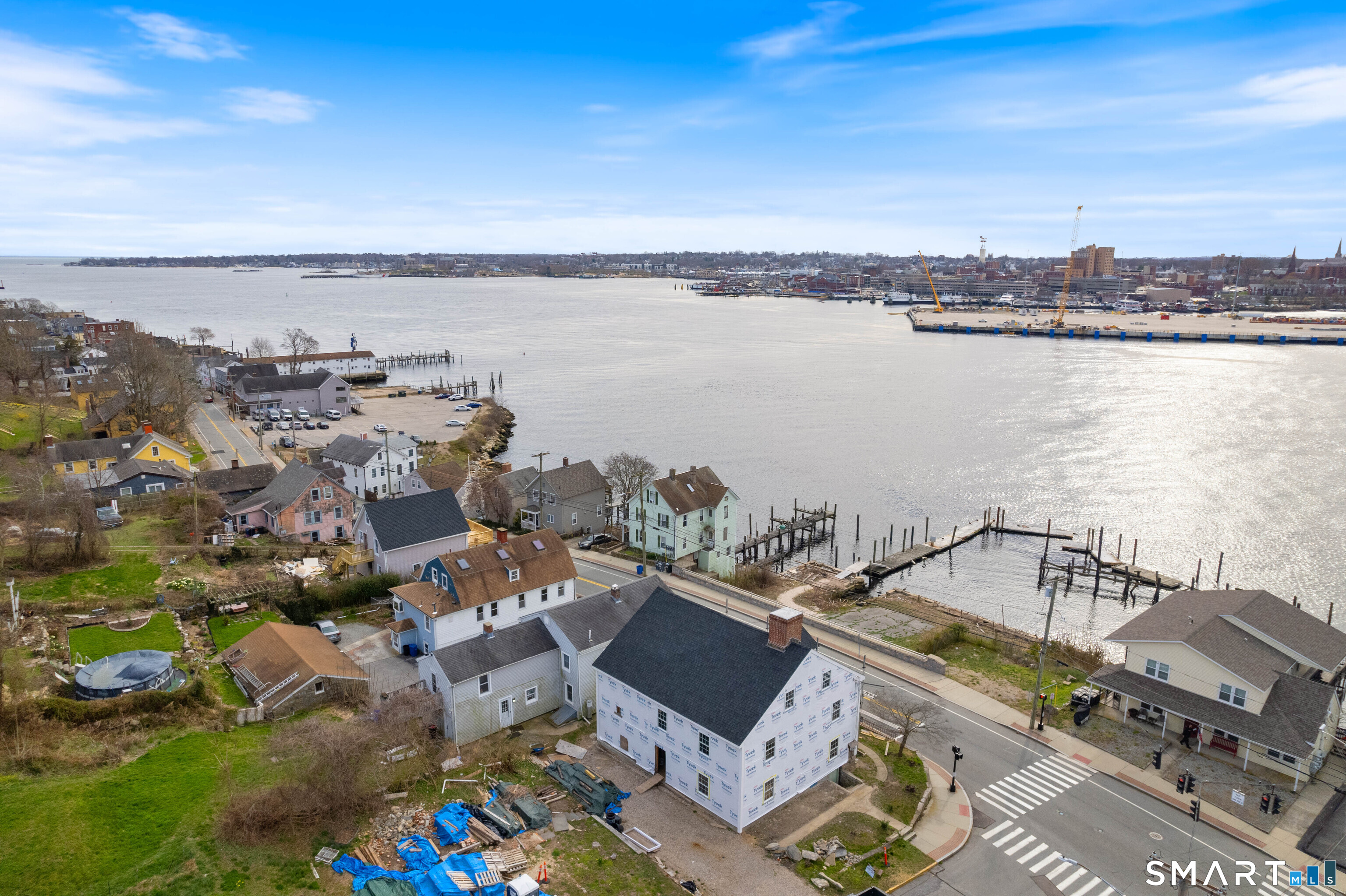 108 Thames Street Groton, CT 06340 - Photo 6 of 40 a view of a city and ocean view