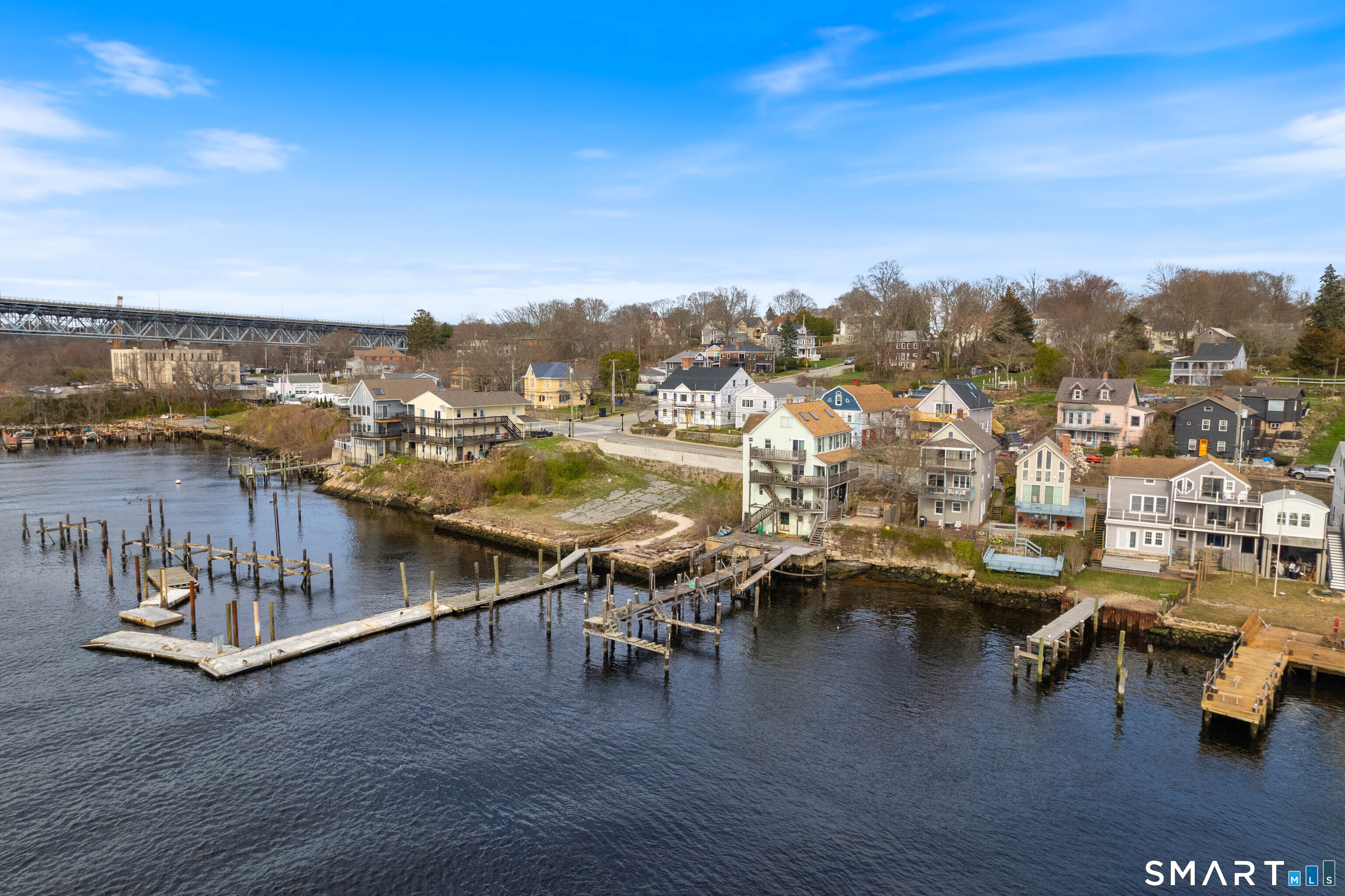 108 Thames Street Groton, CT 06340 - Photo 8 of 40 a view of swimming pool with outdoor seating and city view