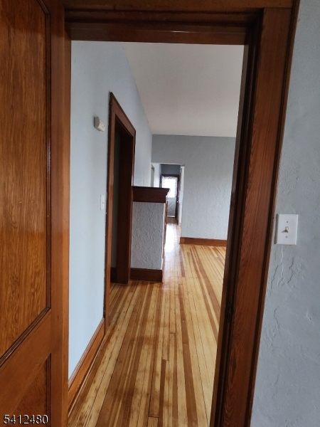656 Summer Street, Unit 2 Elizabeth, NJ 07202 - Photo 3 of 10 a view of wooden floor in a room