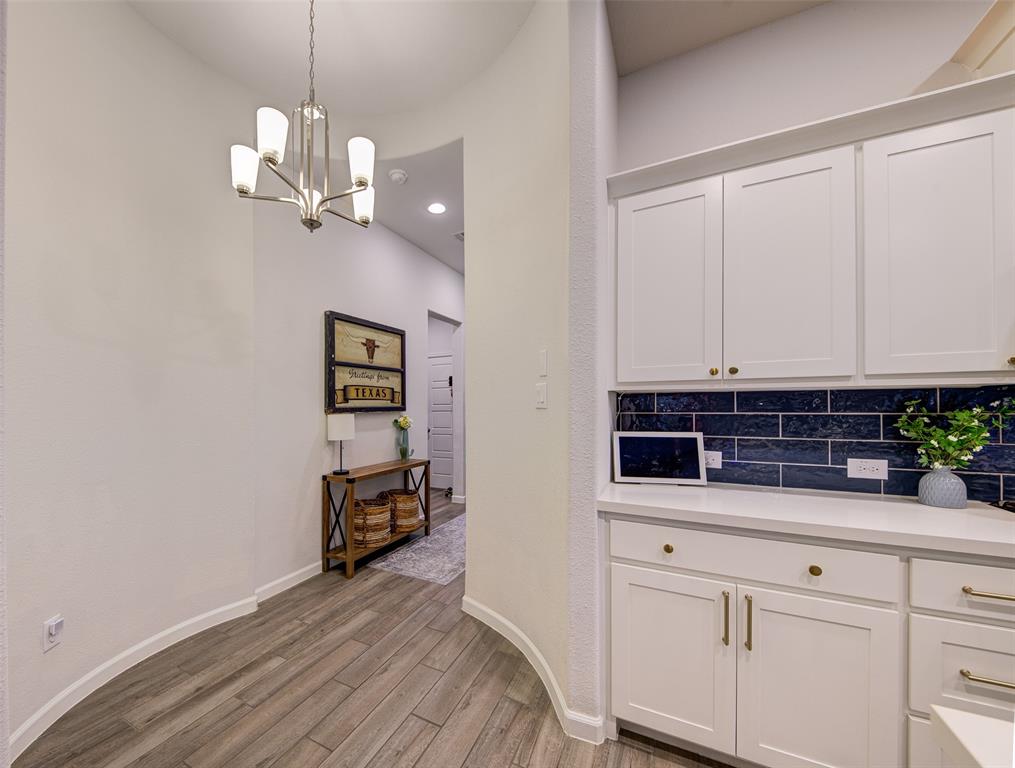 162 Palo Duro Bend Rhome, TX 76078 - Photo 7 of 25 Foyer leading to the kitchen