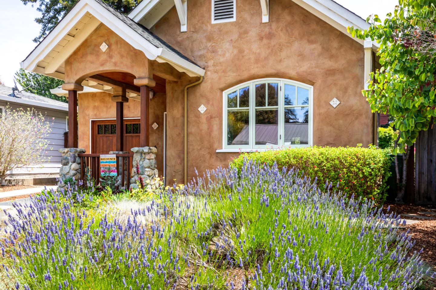 front view of a house with a yard