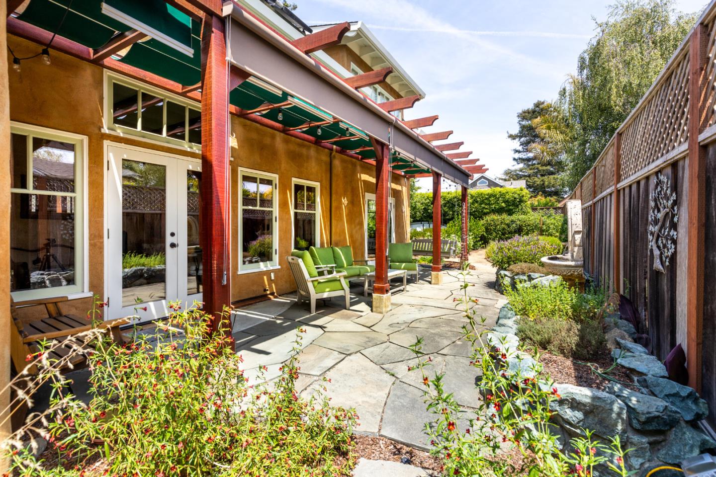 508 Oak Drive Capitola, CA 95010 - Photo 17 of 31 a view of a house with sitting area and garden