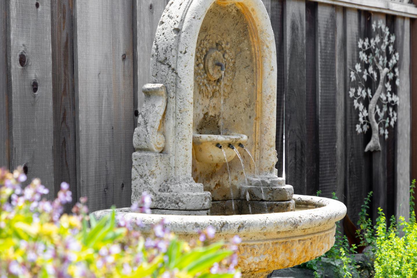 508 Oak Drive Capitola, CA 95010 - Photo 27 of 31 a bathroom with a granite countertop sink and a mirror