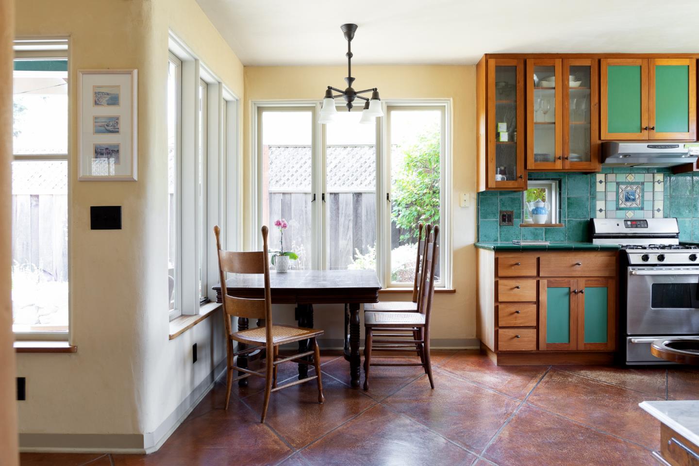 508 Oak Drive Capitola, CA 95010 - Photo 8 of 31 a view of a dining room with furniture window and wooden floor