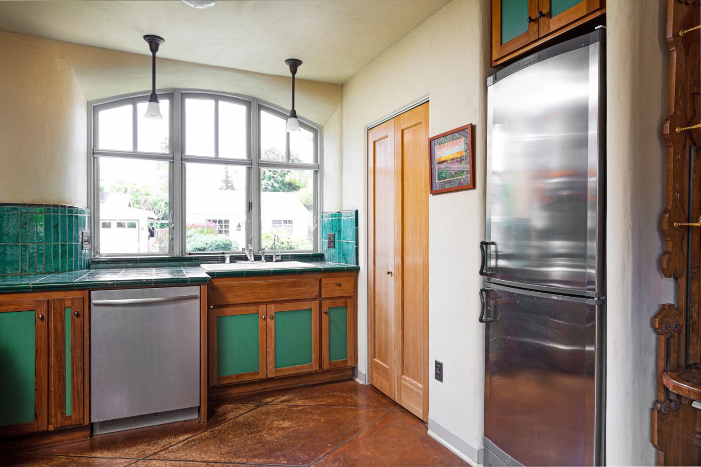 508 Oak Drive Capitola, CA 95010 - Photo 9 of 31 a kitchen with stainless steel appliances granite countertop a refrigerator and a sink