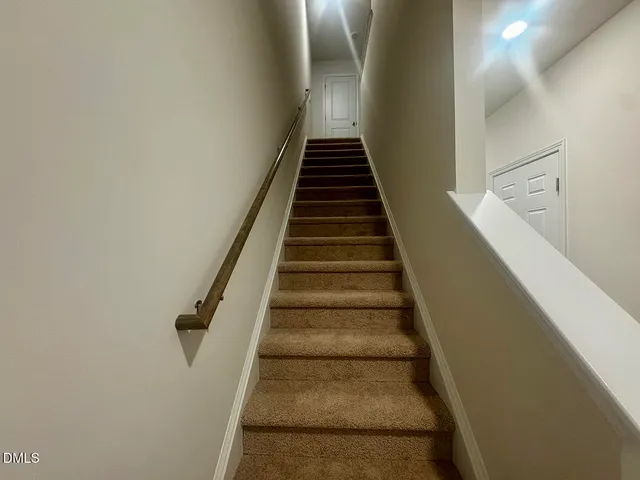 a view of a livingroom with a staircase