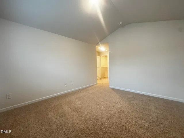 a view of a room with a window