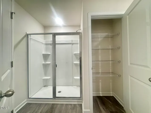 an empty room with a empty space and a window