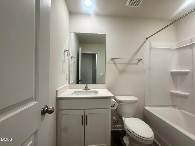 a bathroom with a bath tub and a shower