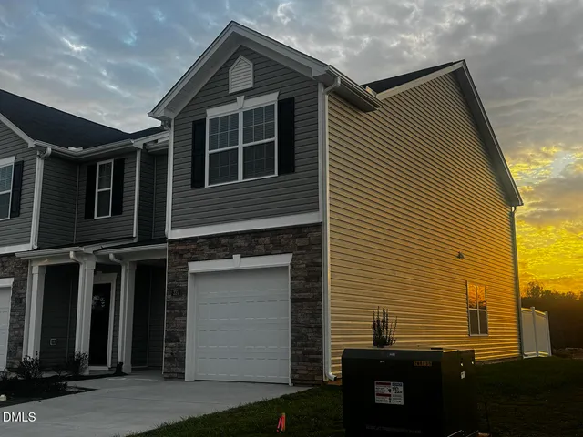 a picture of a bathroom with a sink and a painting