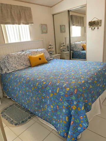 a view of beach and kitchen