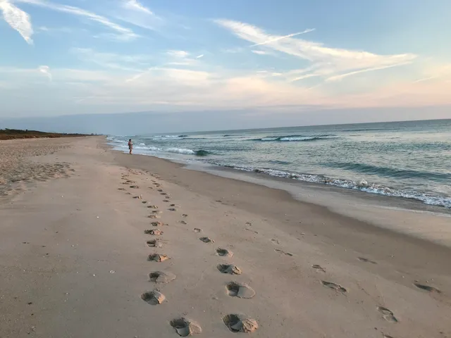 a view of ocean with a house