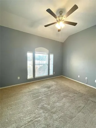 en view of an empty room with a window