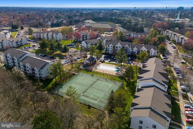 an aerial view of a city with lots of residential buildings
