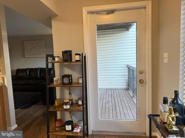 a room with two chairs and a window