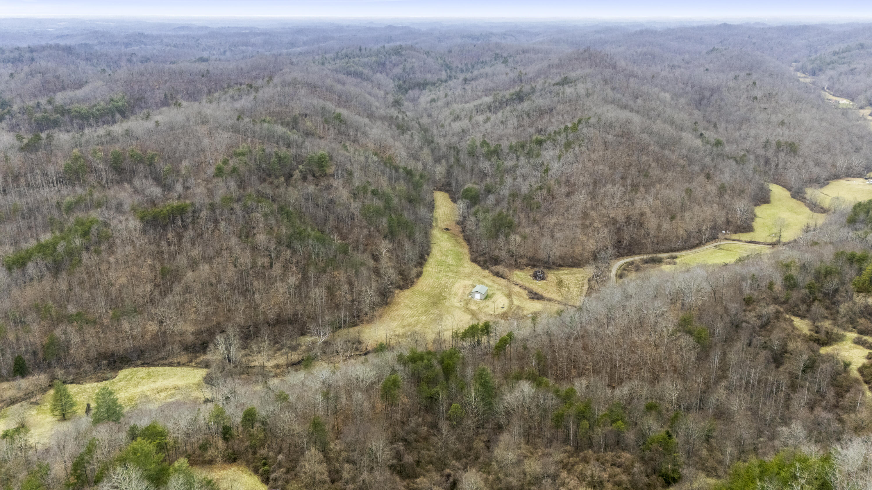 1657 Cave Branch Road Campton, KY 41301 - Photo 23 of 26 DJI_20250205114754_0183_D