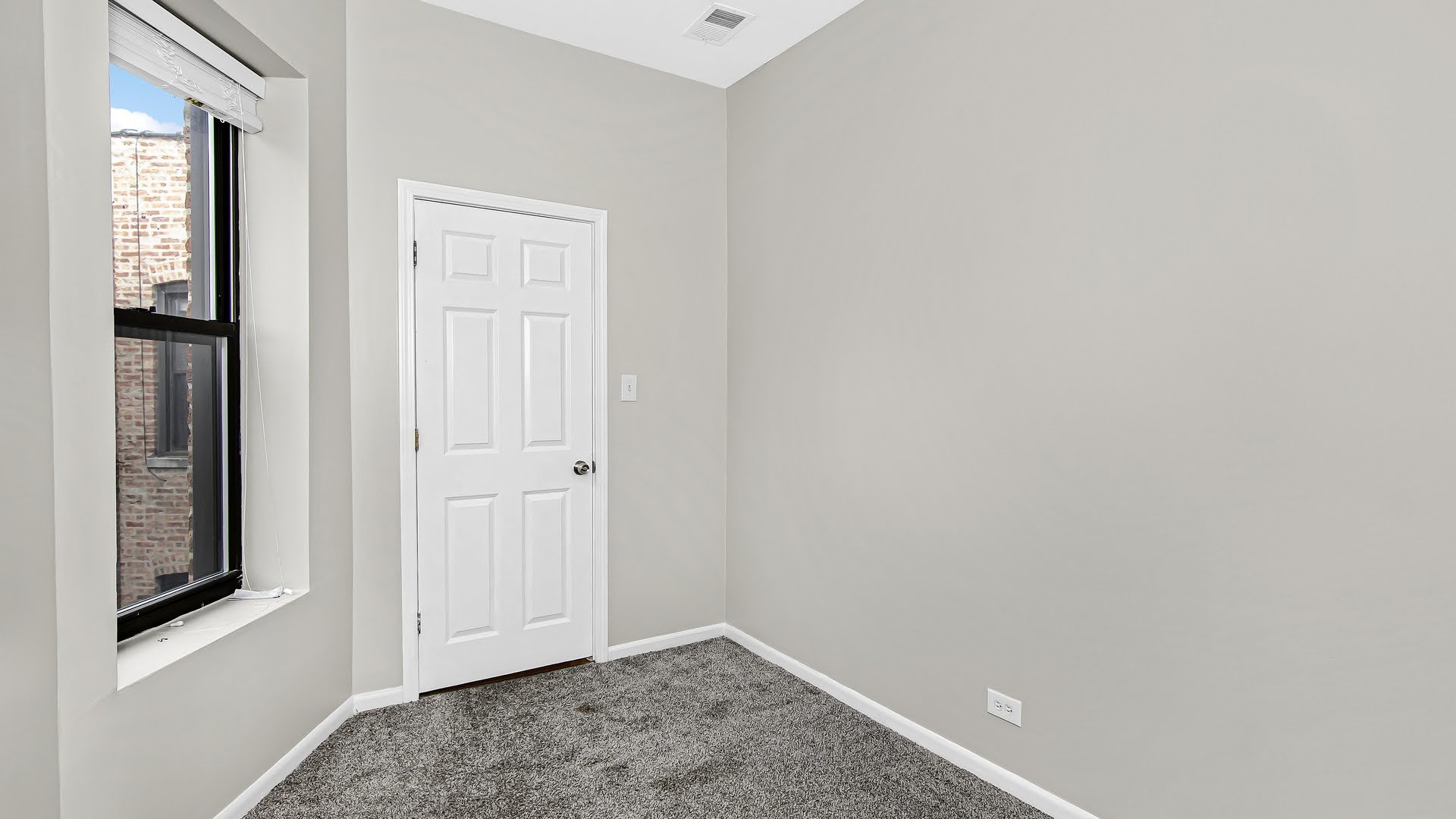 4055 South Calumet Avenue, Unit 3 Chicago, IL 60653 - Photo 11 of 15 a view of an entryway with wooden floor