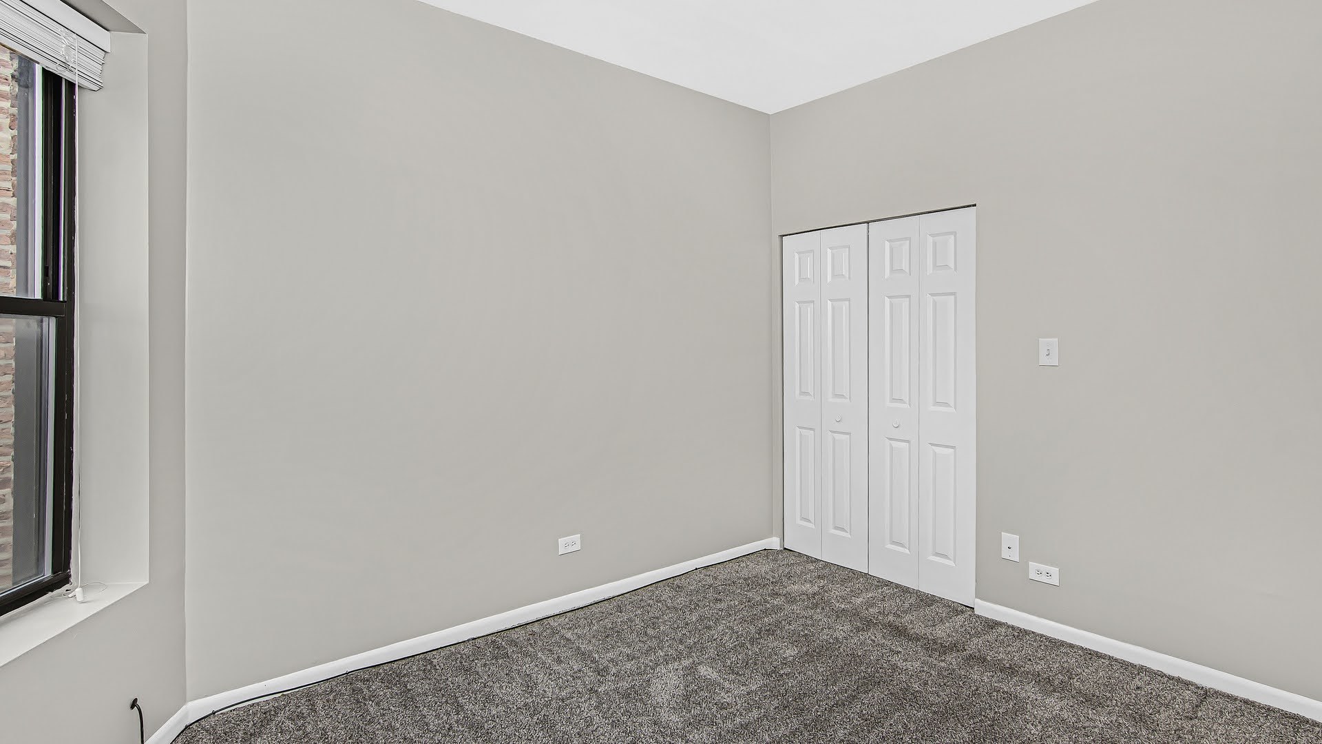 4055 South Calumet Avenue, Unit 3 Chicago, IL 60653 - Photo 12 of 15 a view of an empty room