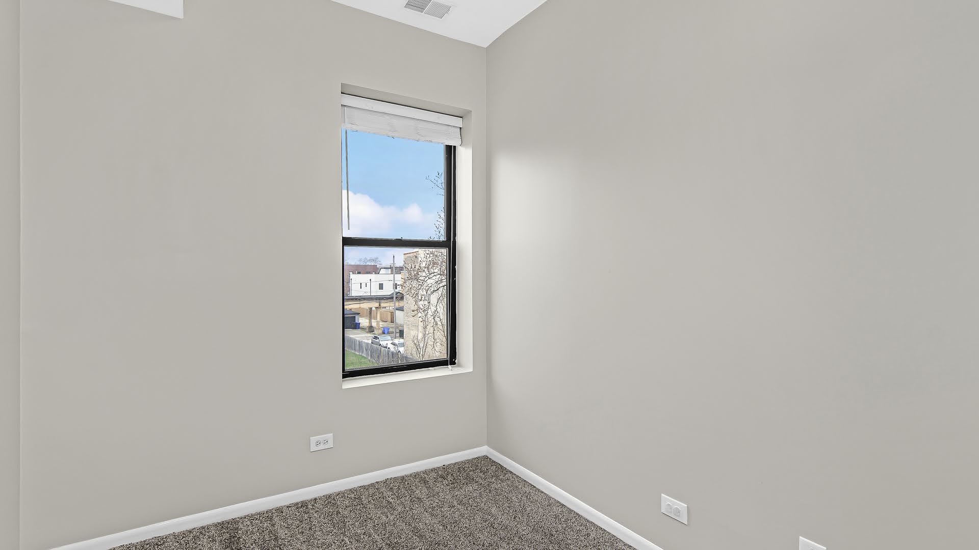 4055 South Calumet Avenue, Unit 3 Chicago, IL 60653 - Photo 14 of 15 a view of a small space with a window
