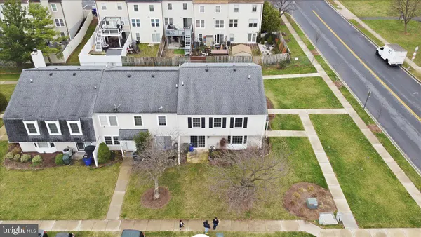 a view of swimming pool with a chairs