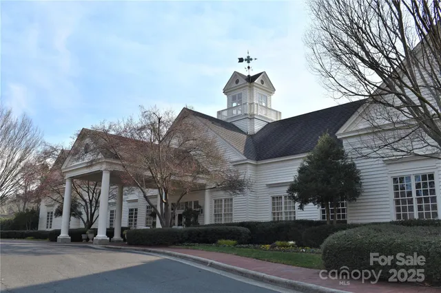 a view of a building with a street