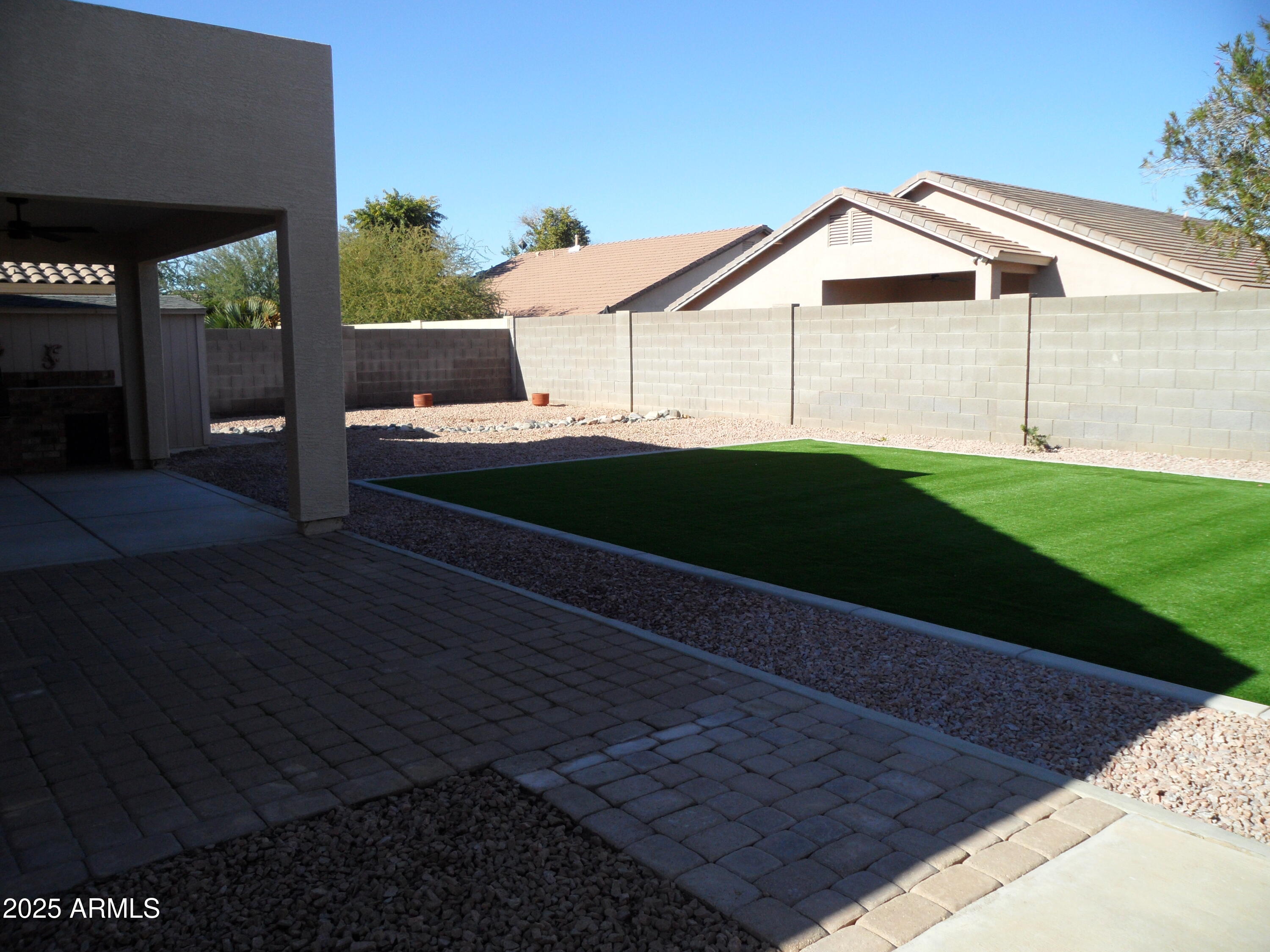 3812 South Seton Avenue Gilbert, AZ 85297 - Photo 16 of 18 a house view with a garden space