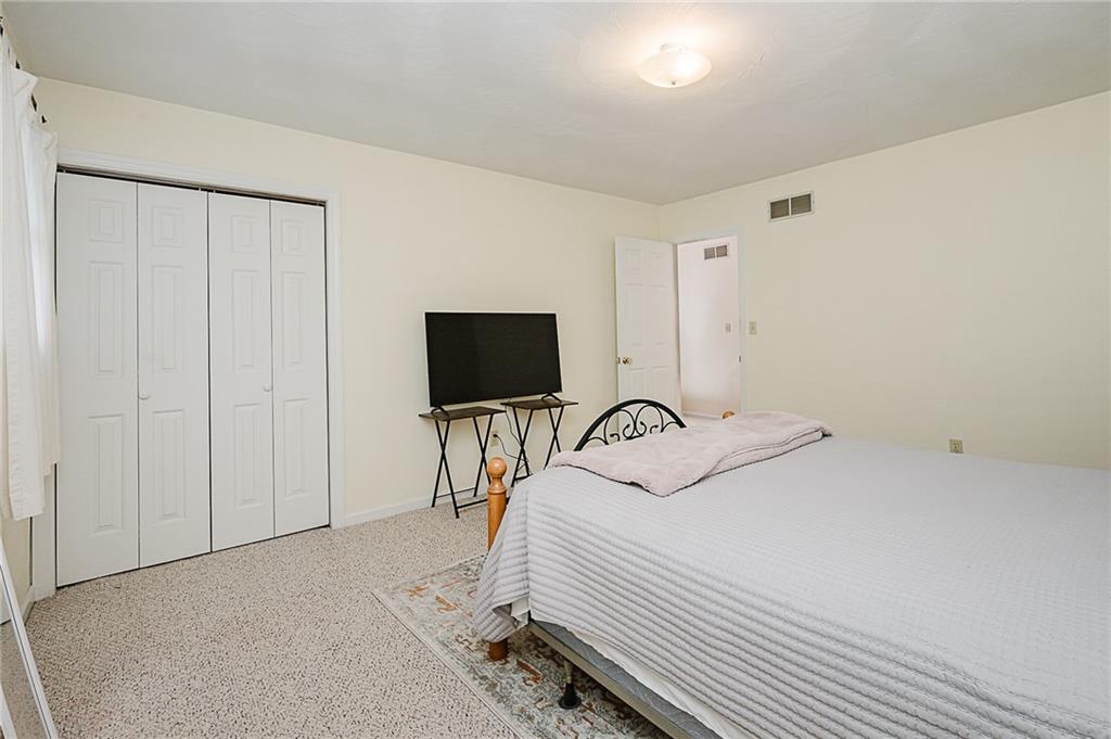 4852 Lucerne Road Indiana, PA 15701 - Photo 18 of 22 a bedroom with a bed and a flat screen tv