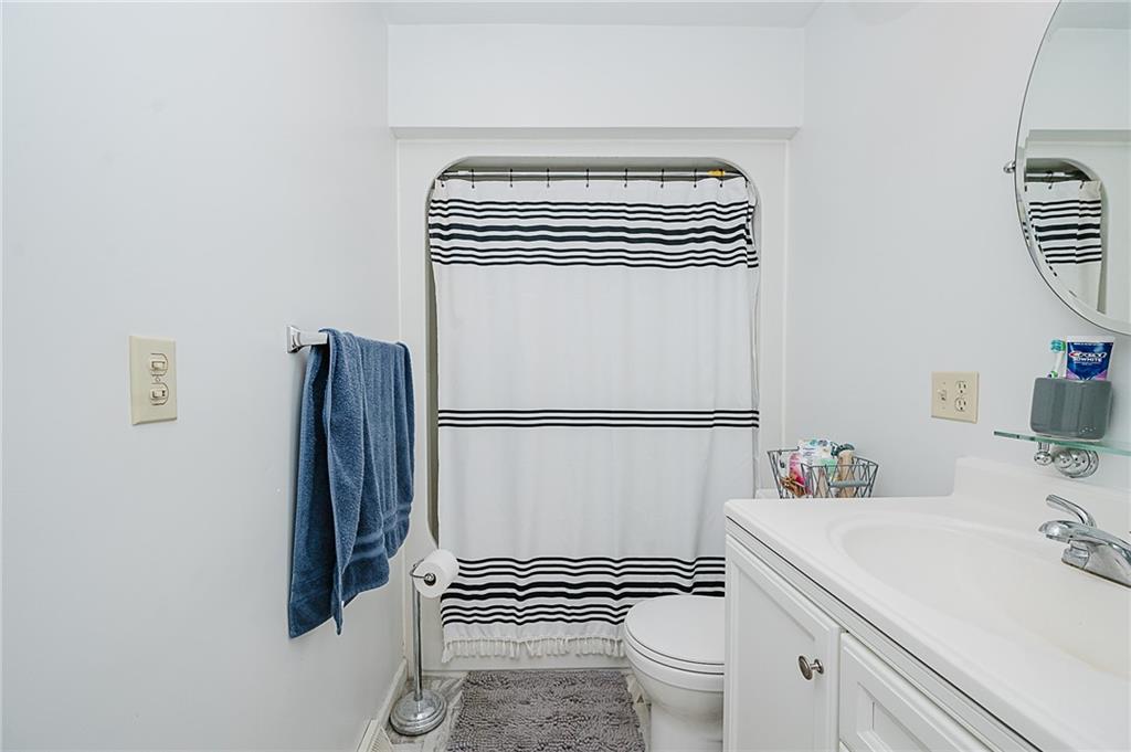 4852 Lucerne Road Indiana, PA 15701 - Photo 19 of 22 a bathroom with a granite countertop toilet and a sink