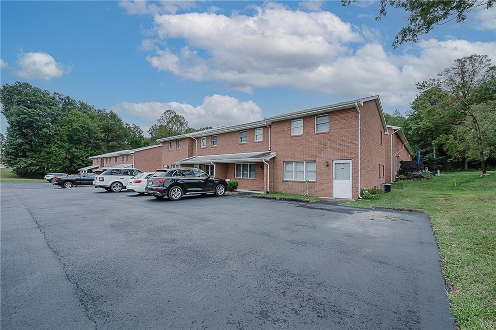 4852 Lucerne Road Indiana, PA 15701 - Photo 21 of 22 a car parked in front of house with a yard