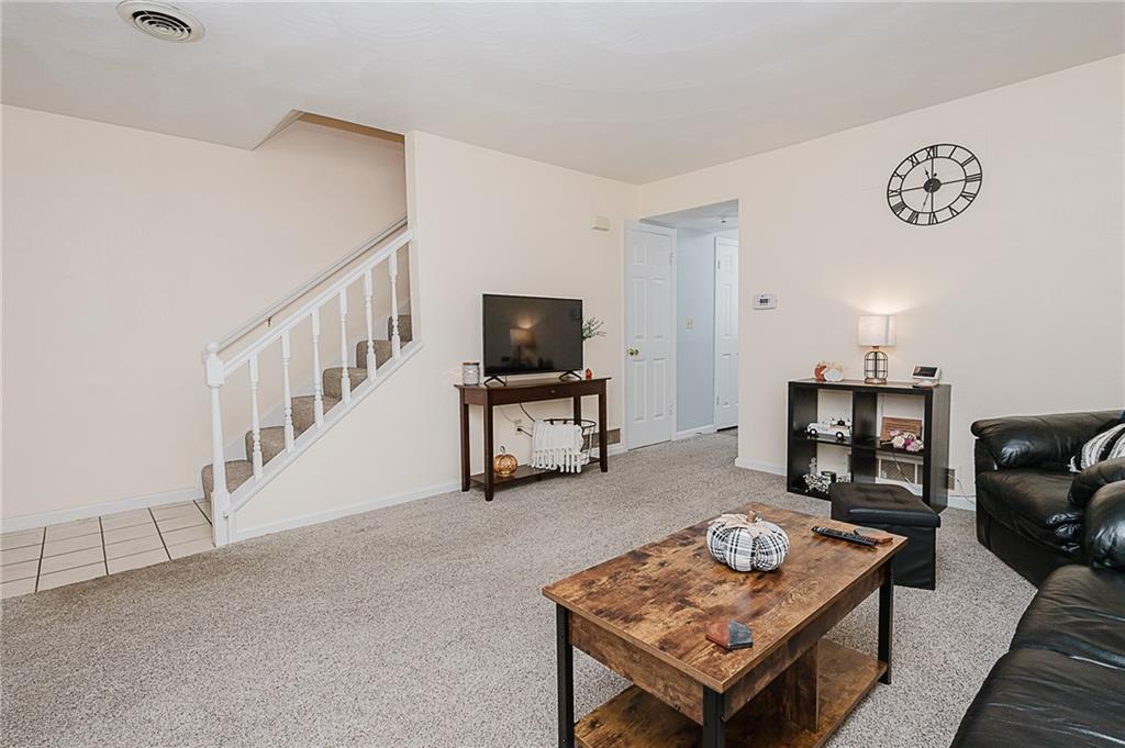 4852 Lucerne Road Indiana, PA 15701 - Photo 3 of 22 a living room with furniture and a flat screen tv
