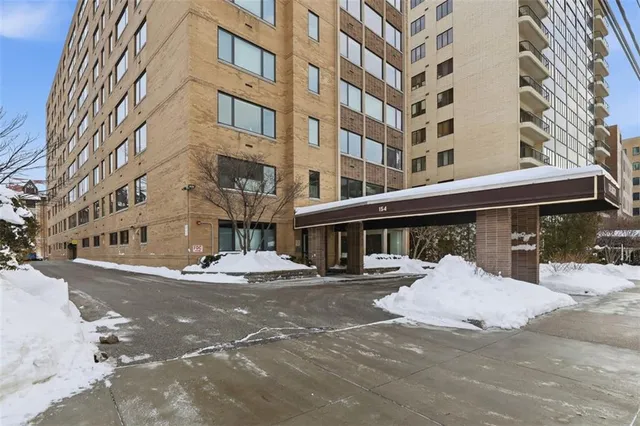 a view of a building with a street