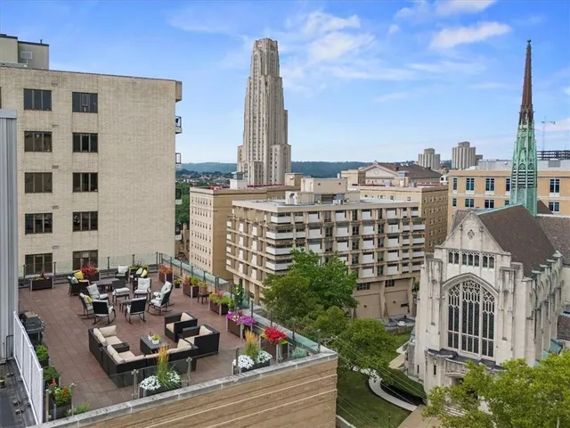 a view of city with tall buildings