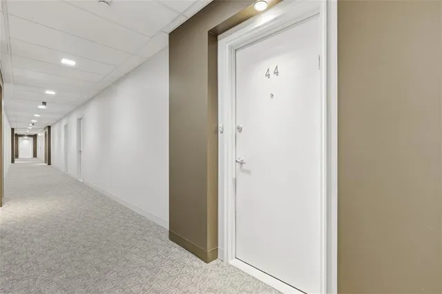 a view of a hallway with closet