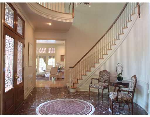 1005 West Waldheim Road Fox Chapel, PA 15215 - Photo 2 of 8 Entry/Foyer. A grand marble entry with double bevelled glass doors, and curved staircase leading to open second story.
