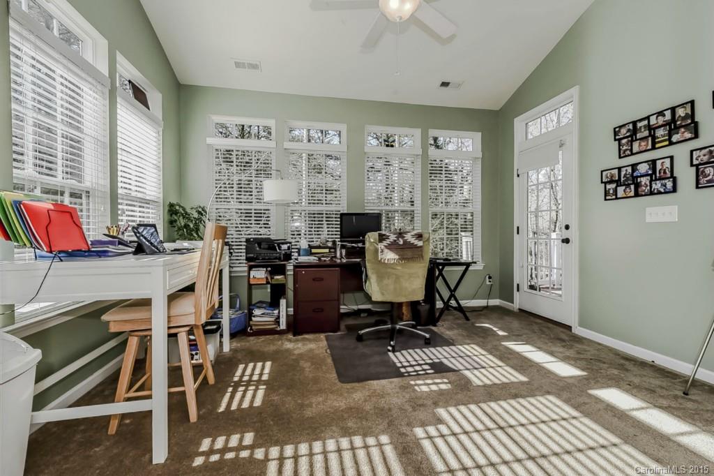 315 Calming Way Tega Cay, SC 29708 - Photo 13 of 24 a view of a workspace with furniture and a window