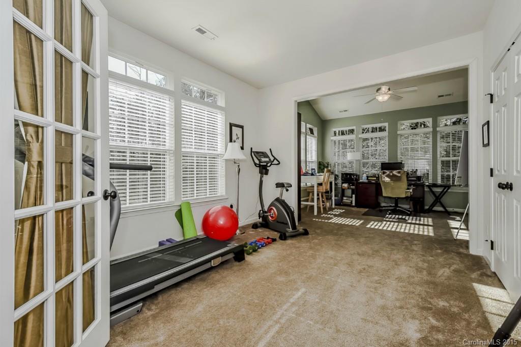 315 Calming Way Tega Cay, SC 29708 - Photo 14 of 24 a view of a room with gym equipment
