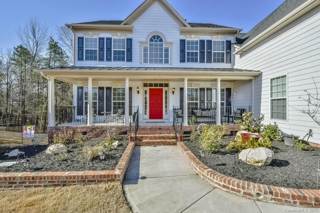 315 Calming Way Tega Cay, SC 29708 - Photo 3 of 24 front view of a house with a porch