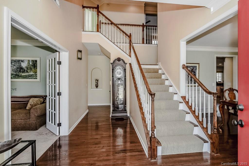 315 Calming Way Tega Cay, SC 29708 - Photo 4 of 24 a view of entryway and hall with wooden floor