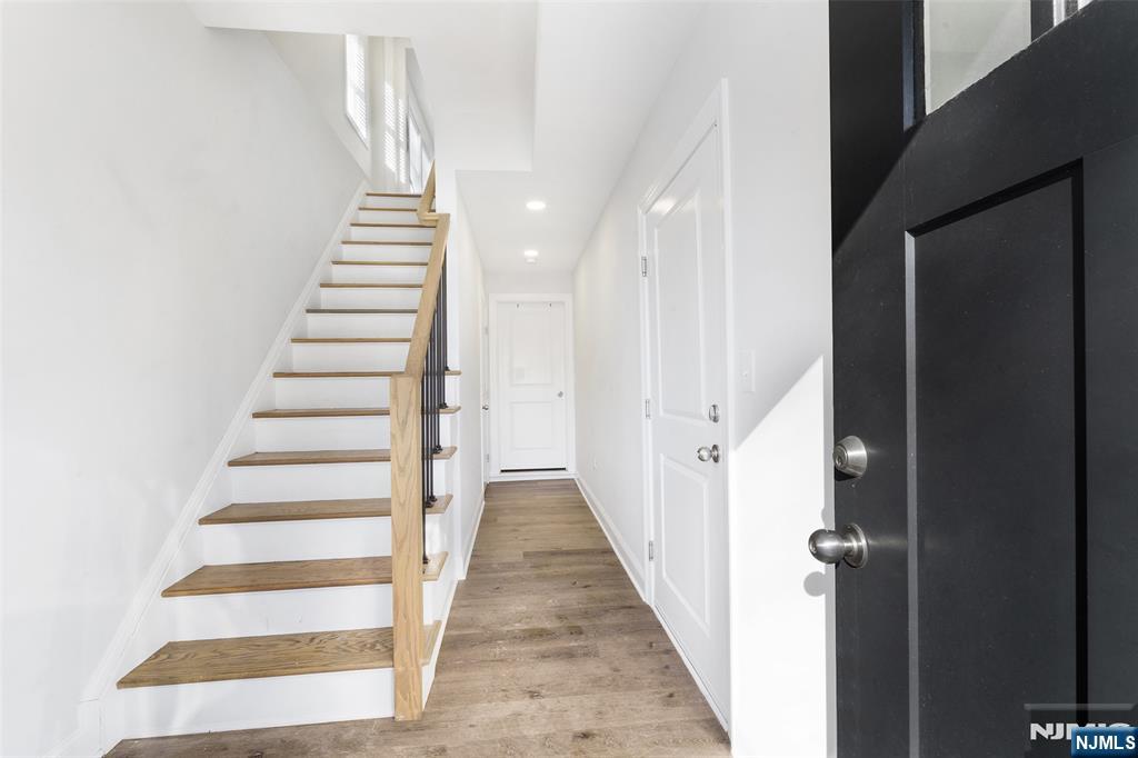 506 Brooklyn Mountain Road Hopatcong, NJ 07843 - Photo 18 of 30 a view of a hallway with wooden floor and entryway