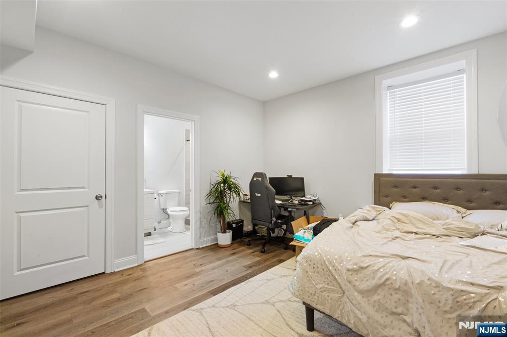 506 Brooklyn Mountain Road Hopatcong, NJ 07843 - Photo 29 of 30 a bedroom with a bed and a desk