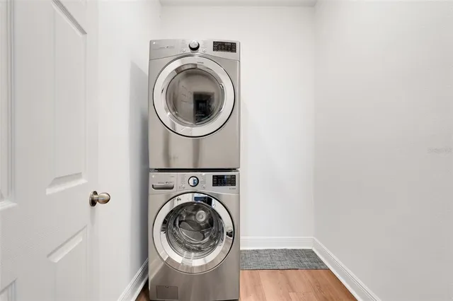 a view of bathroom with a washer and dryer