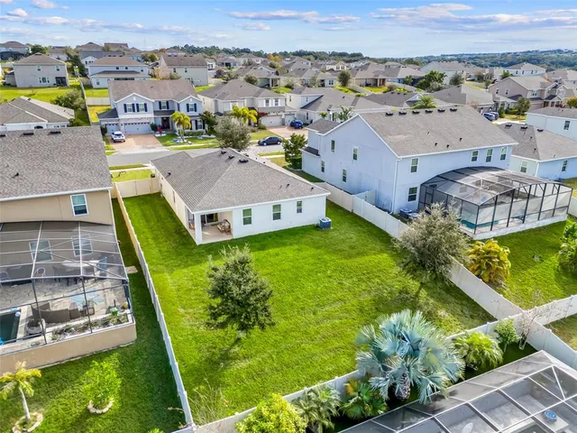 an aerial view of a house with a garden