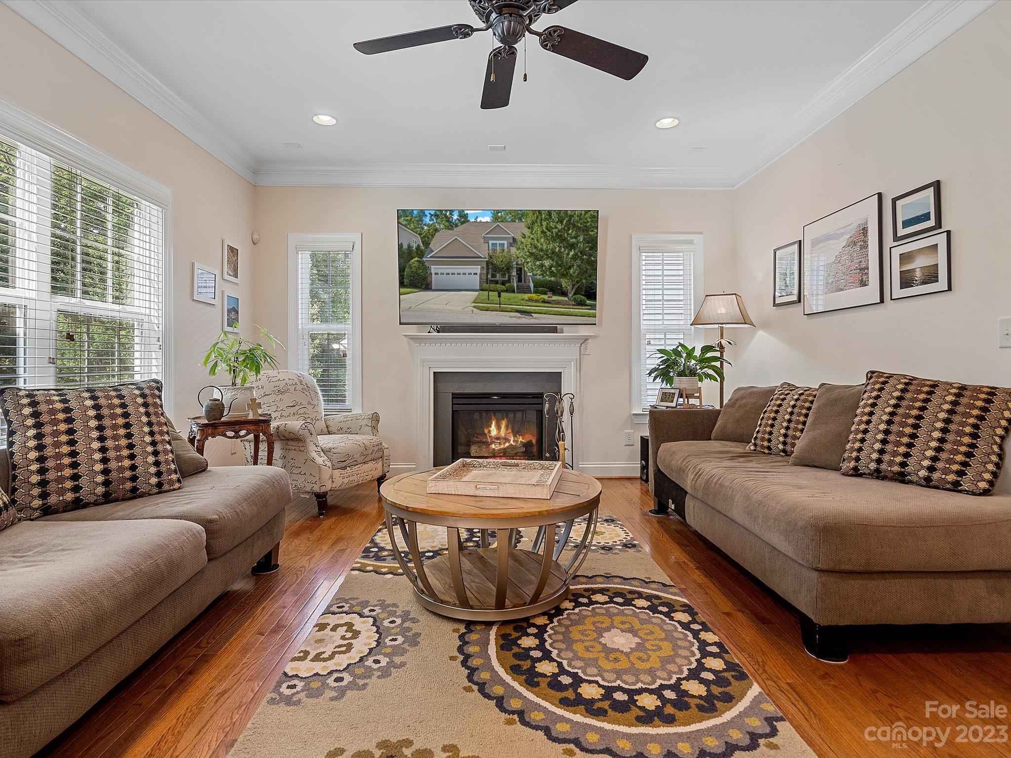 4136 Sunset Ridge Drive Rock Hill, SC 29732 - Photo 14 of 44 a living room with furniture a window and a fireplace