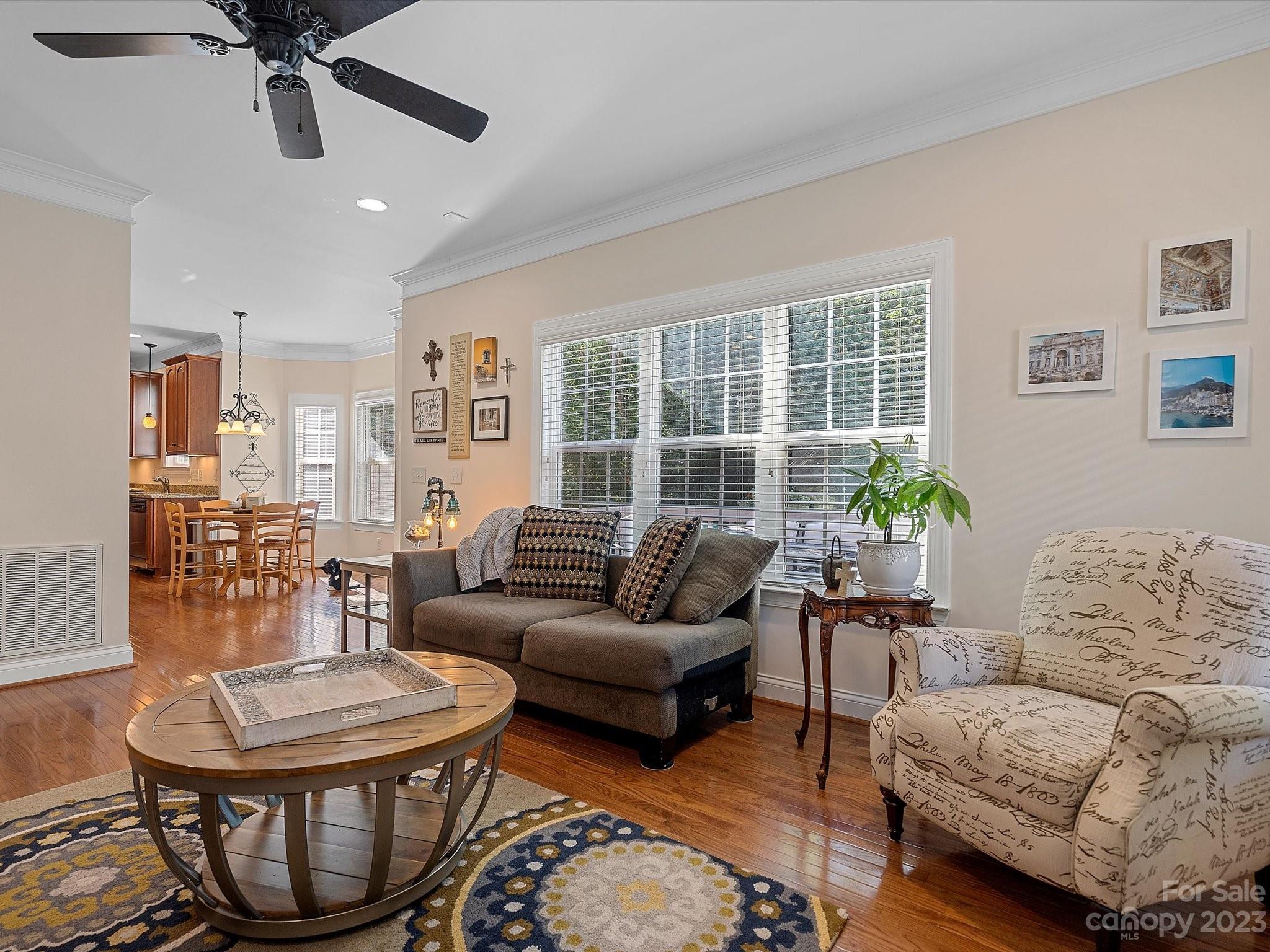 4136 Sunset Ridge Drive Rock Hill, SC 29732 - Photo 15 of 44 a living room with furniture and a large window