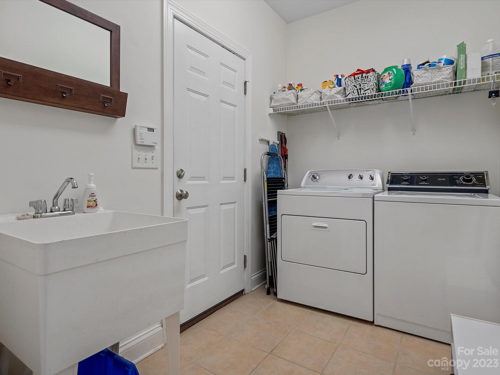 4136 Sunset Ridge Drive Rock Hill, SC 29732 - Photo 24 of 44 a utility room with sink dryer and washer
