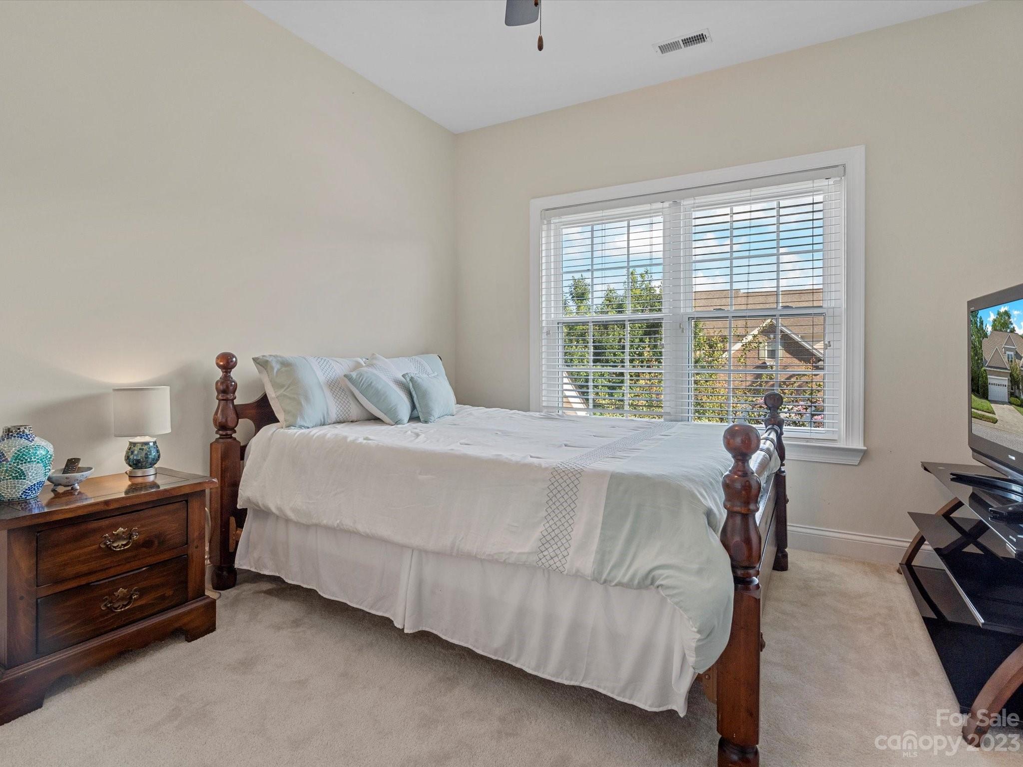 4136 Sunset Ridge Drive Rock Hill, SC 29732 - Photo 29 of 44 a bedroom with a bed and a window