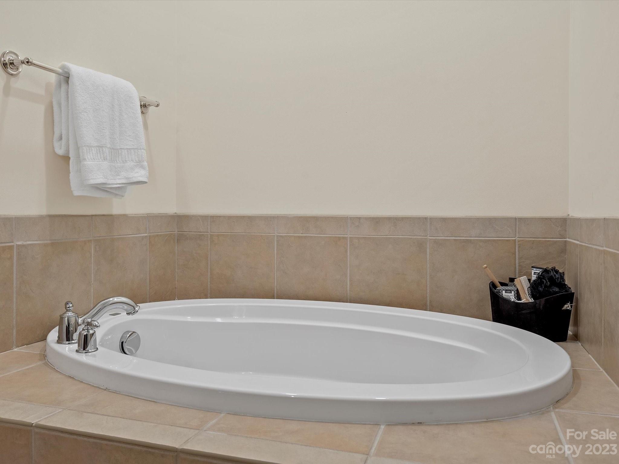 4136 Sunset Ridge Drive Rock Hill, SC 29732 - Photo 34 of 44 a bath tub sitting next to a white marble wall