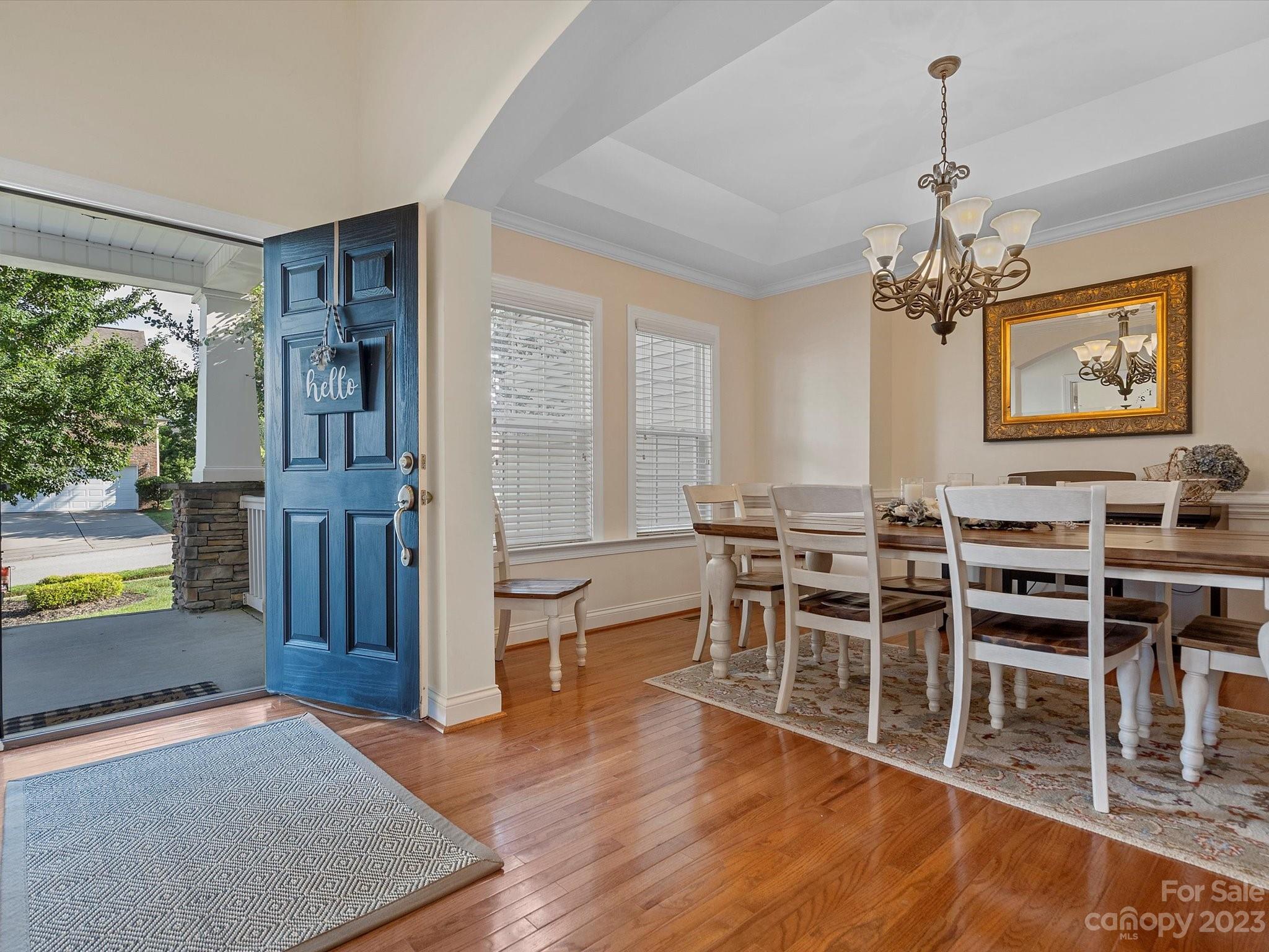 4136 Sunset Ridge Drive Rock Hill, SC 29732 - Photo 6 of 44 a view of a dining room with furniture window and wooden floor