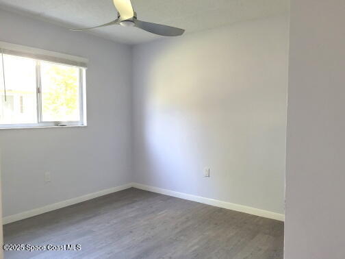 732 Ridge Club Drive, Unit 49 Melbourne, FL 32934 - Photo 15 of 20 an empty room with a window